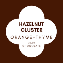 Load image into Gallery viewer, Hazelnut Clusters | Orange Thyme | French Dark Chocolate | 62% Cacao | 100g